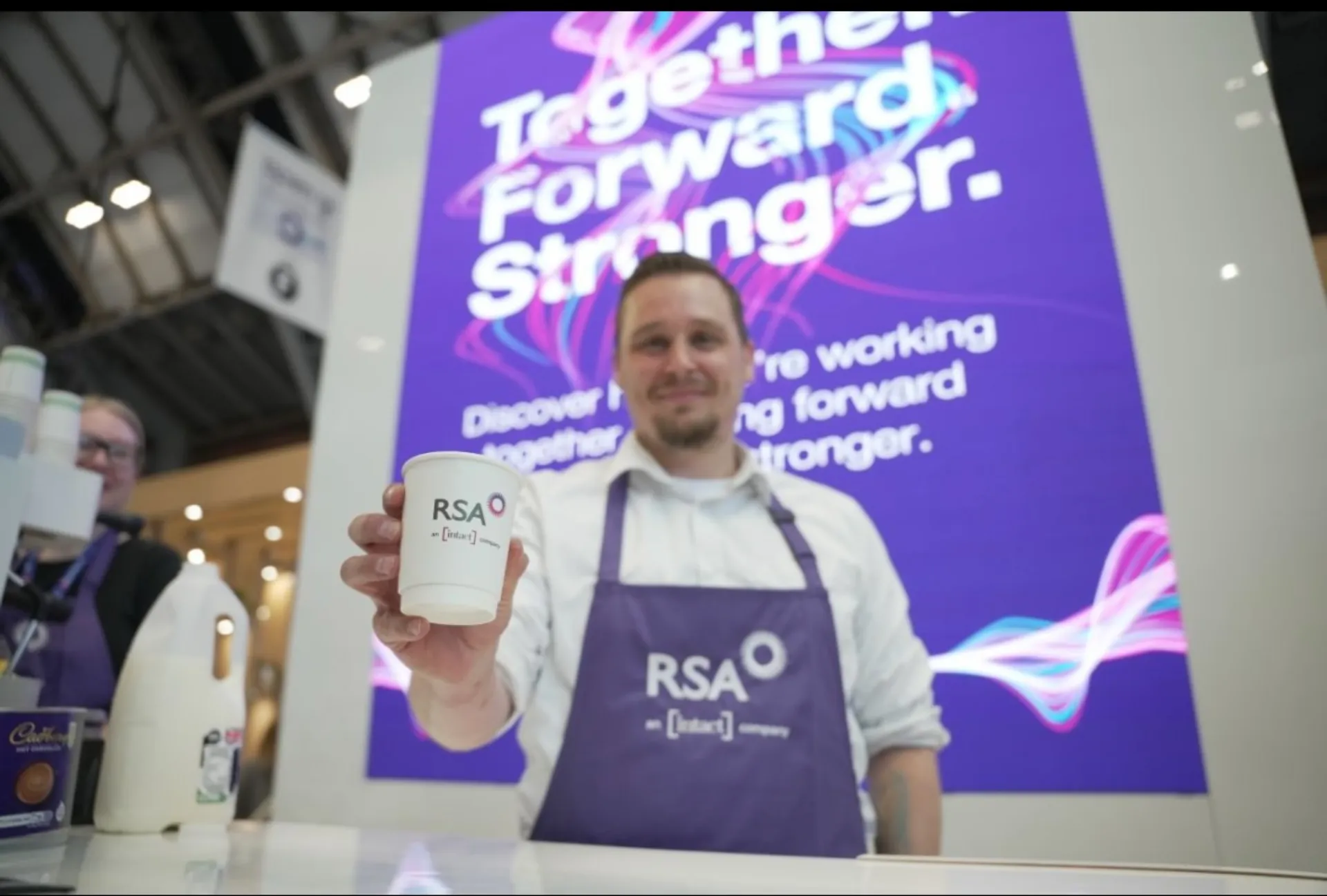 Chris the barista for KoalaKoffee coffee exhibition stand for RSA at Airmic 2025 in Liverpool